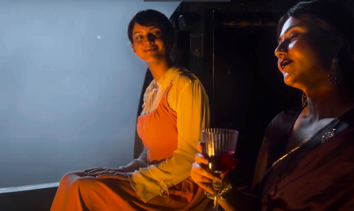 Tripti Damri and Swastika Mukherjee is sitting on a boat in the middle of the sea and at night. They are listening to the song Bikharney Ka Mujhko Shauq Hai Bada and is mesmerized by it.